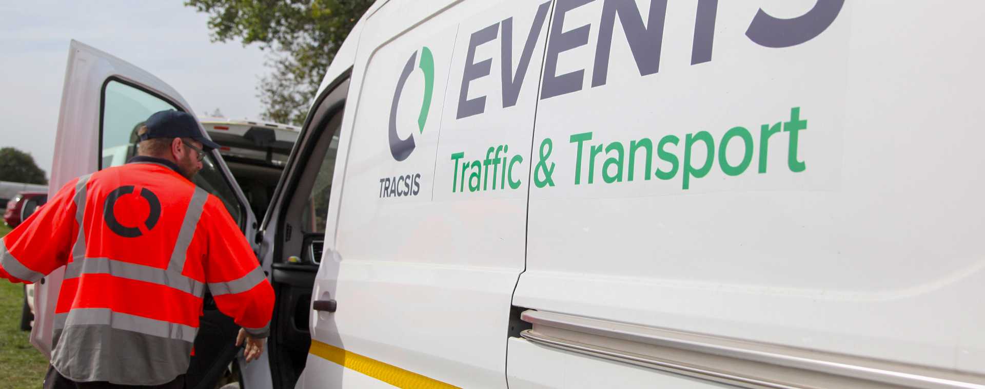 A person exiting a Tracsis Events Traffic and Transport van