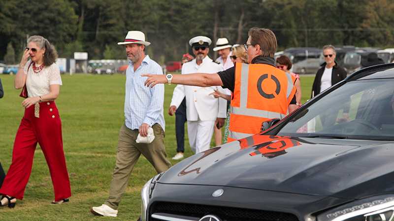 A Tracsis Events Marshal directing foot traffic
