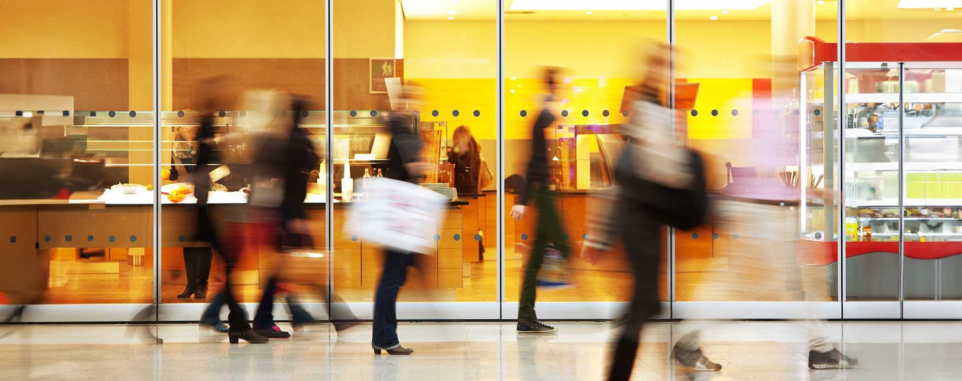Abstract image of blurred shoppers walking